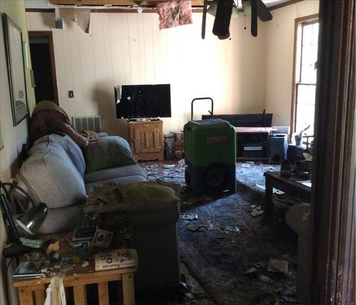 A living room has endured water damage