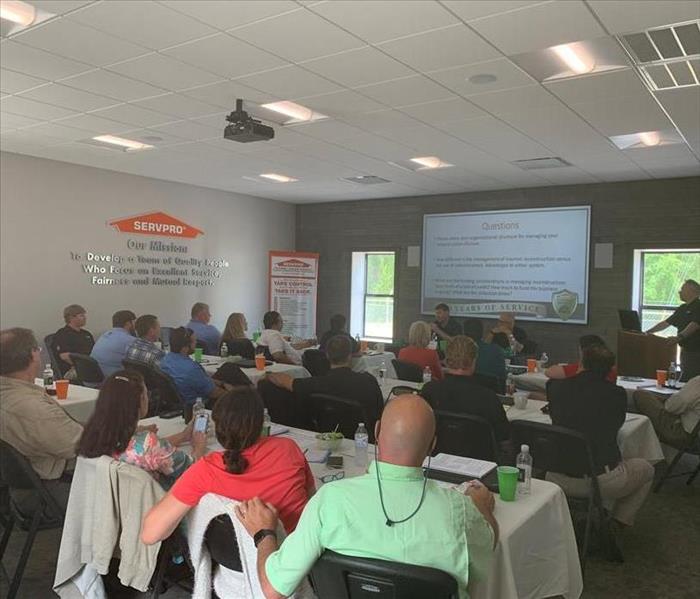 Our conference room filled with SERVPRO Franchise Owners